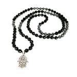 Load image into Gallery viewer, 108 Onyx and Hematite Hamsa mala in sterling silver

